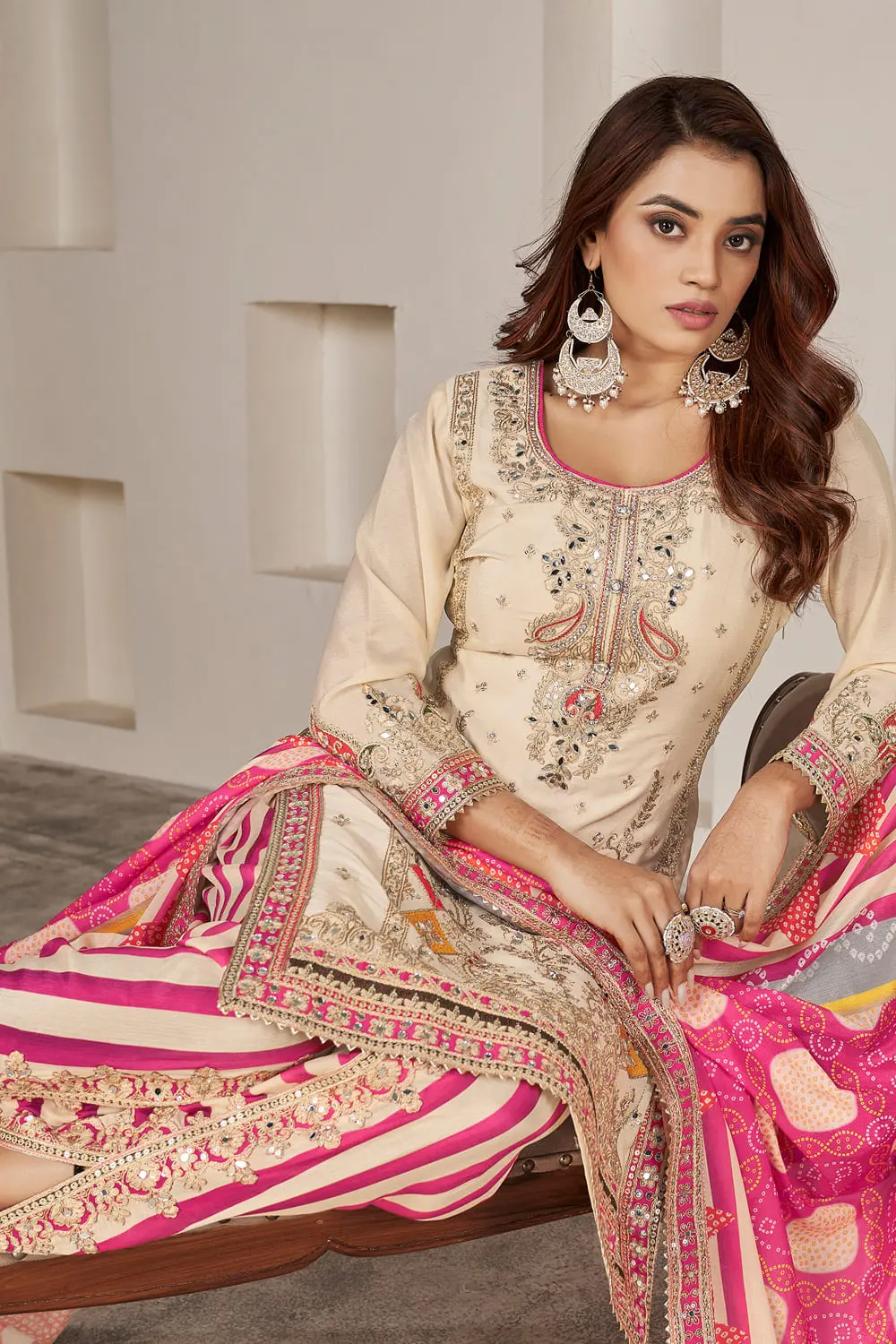 Sequins and shisha mirror embroidery on sleeves of beige chinon kurti