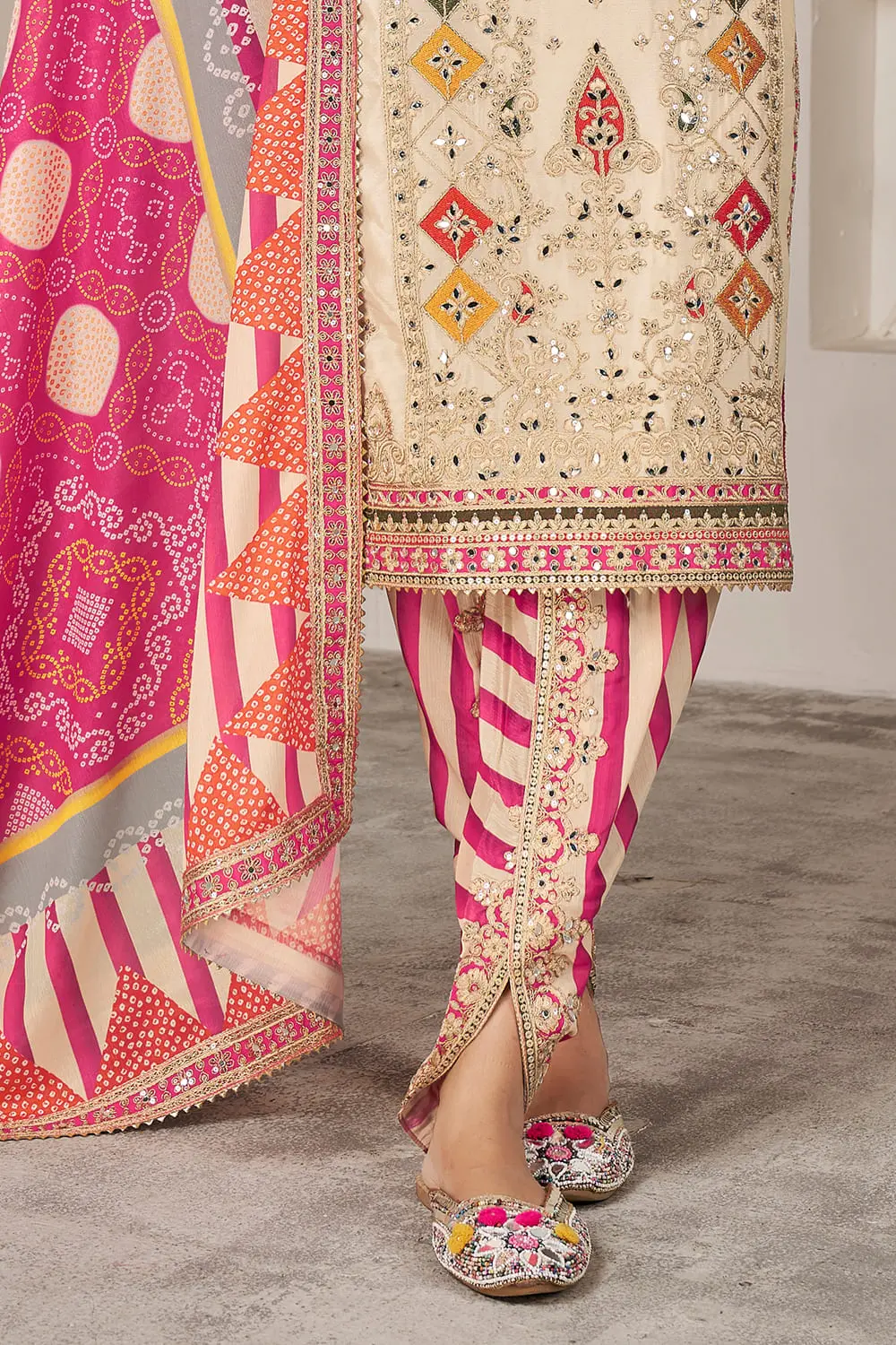 Soft beige dhoti tulip pant with embroidery lace and mirror work detailing