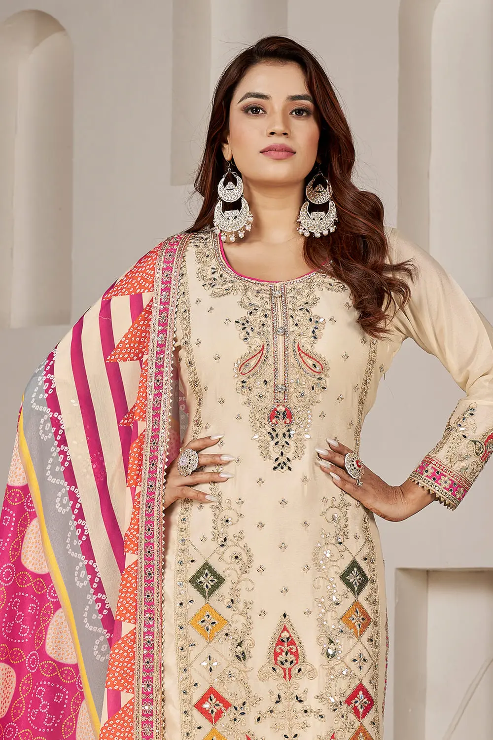Back view of beige dhoti tulip pant kurta set styled with printed dupatta