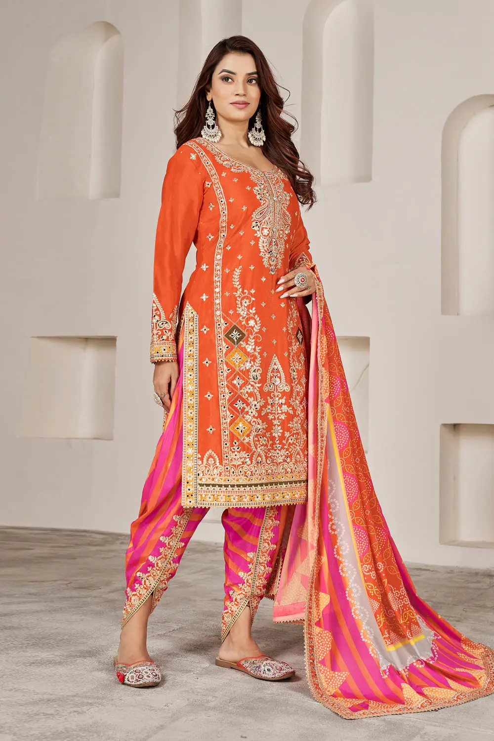 Bright orange dhoti tulip pant with embroidery lace and mirror work detailing