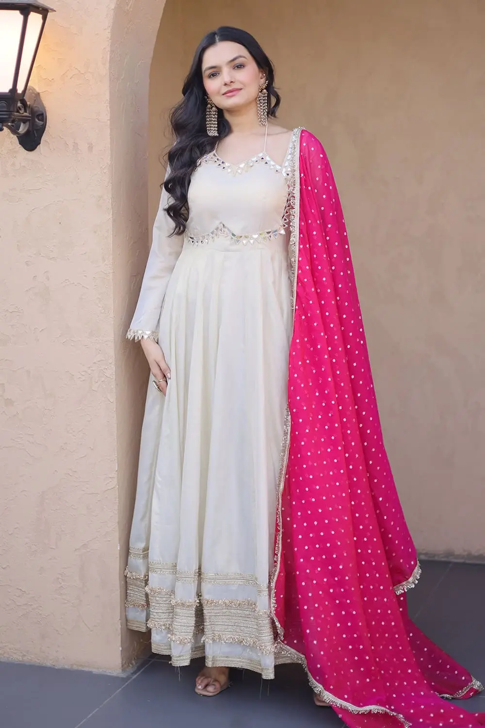 Ivory anarkali styled with soft pink moss butti dupatta and lace border