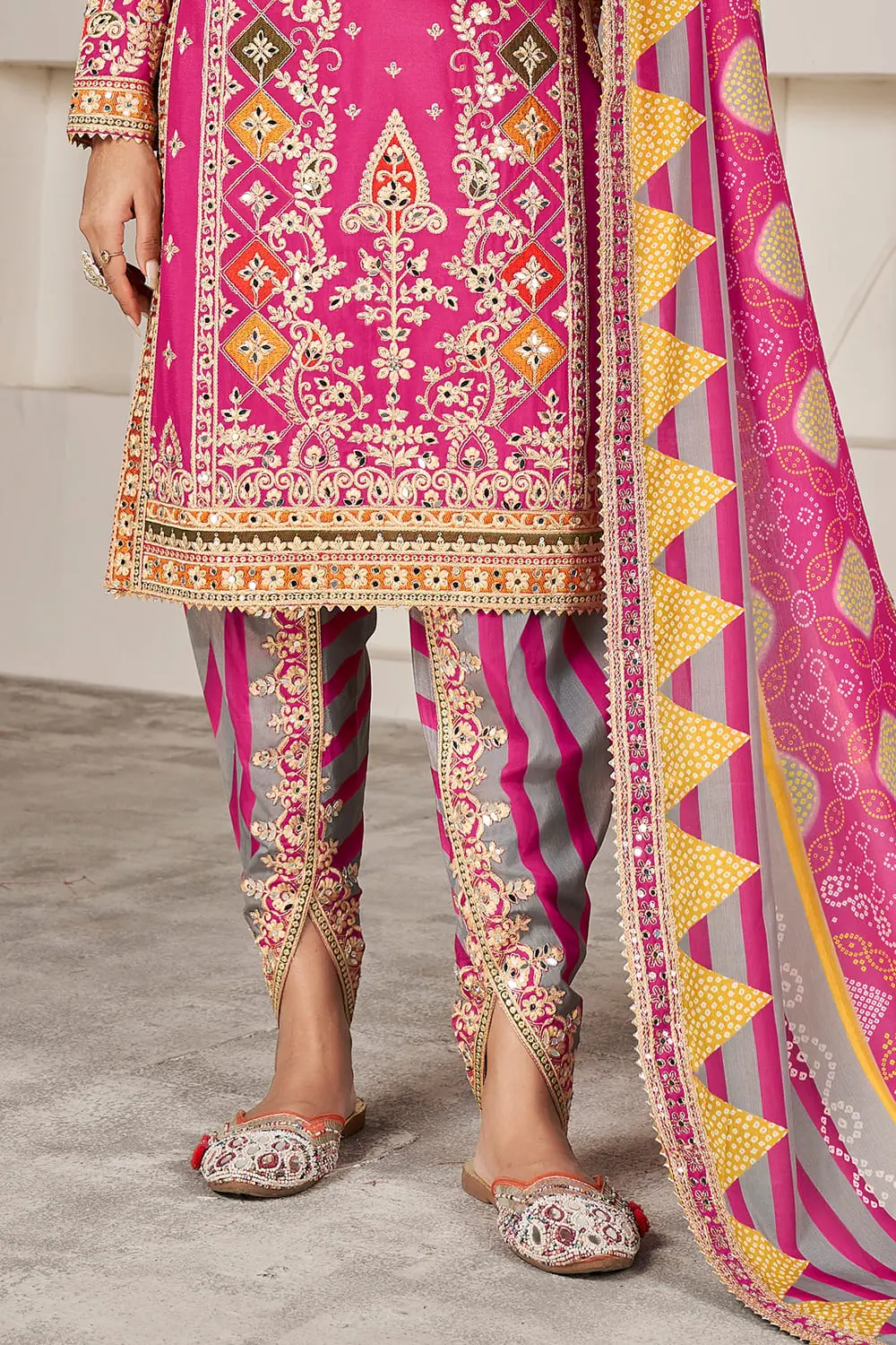 Deep pink dhoti tulip pant with embroidery lace and mirror work detailing