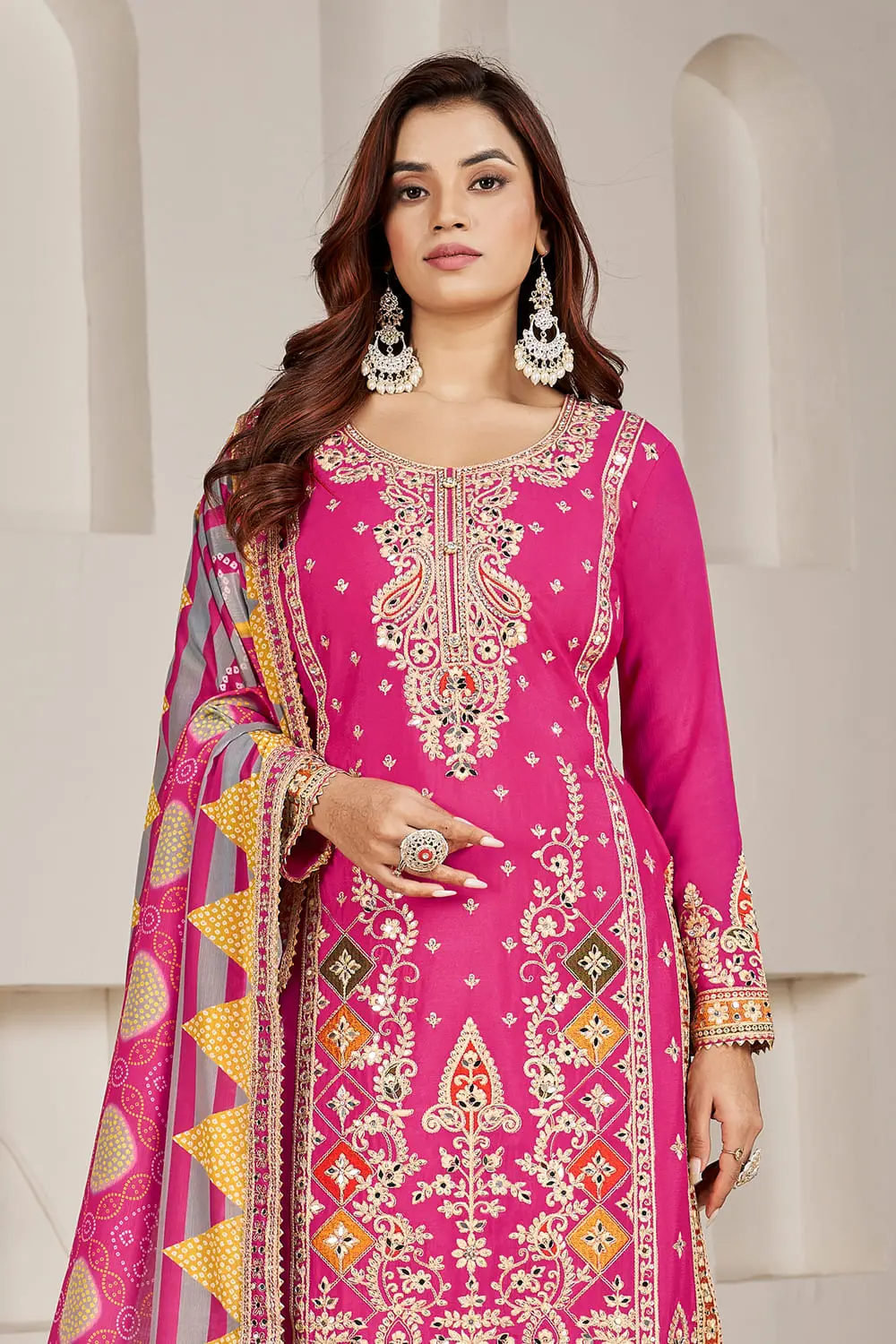 Mirror work and sequins embroidery on sleeves of pink chinon kurti
