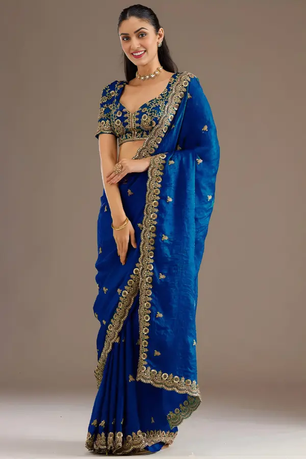 Royal blue tissue silk saree with sequins and zari work by Khaish