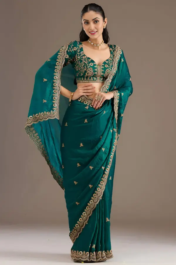 Rama green tissue silk saree with sequins and zari work by Khaish