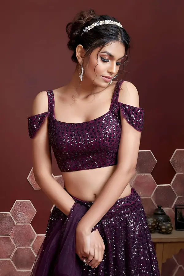 Digital print and embroidery work close up on purple silk lehenga
