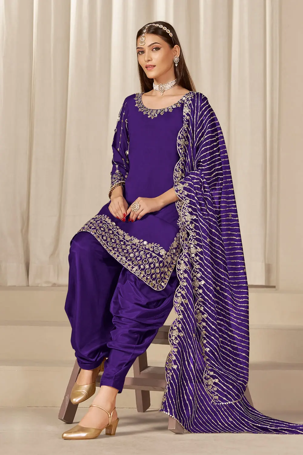Pleated deep purple patiala salwar with soft organza dupatta