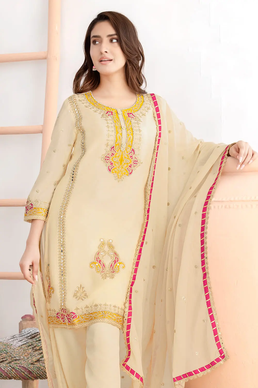Applique work, dabka dori and mirror work on beige chinon top neck and sleeves