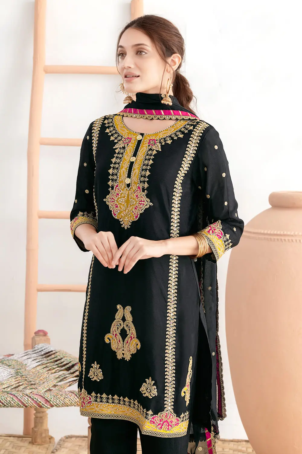 Applique work, dabka dori and mirror work on black chinon top neck and sleeves