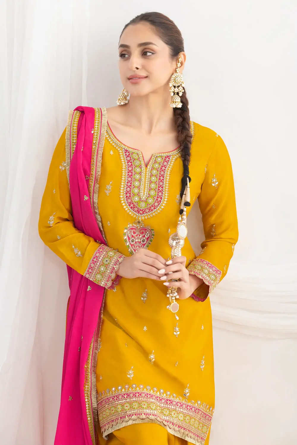 Dabka dori and sequins sleeve embroidery on mustard chinon kurti