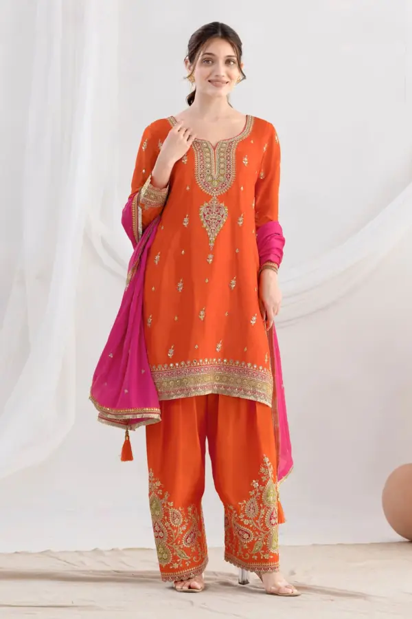 Orange salwar kameez for festivals in chinon with zari dupatta by Khaish