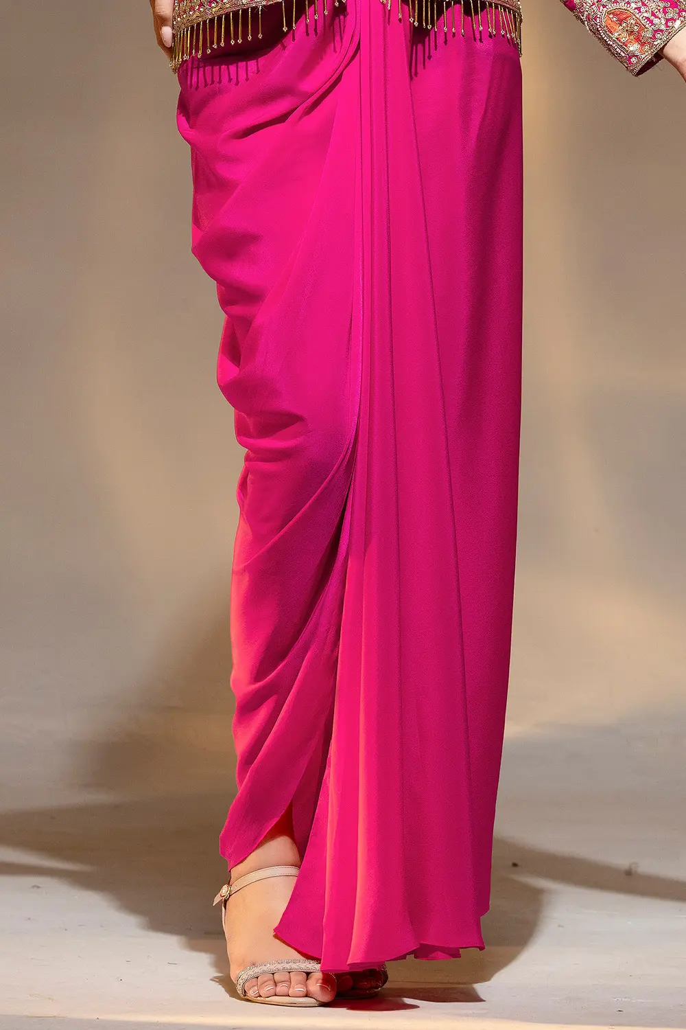 Deep pink cowl draped skirt in premium crape with soft folds