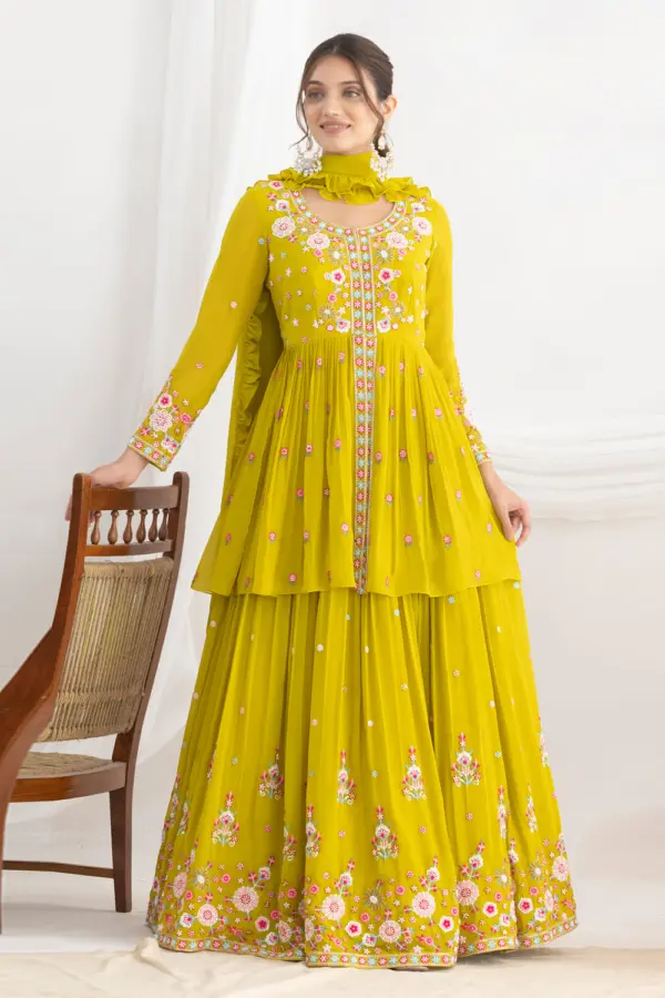 Mustard lehenga choli for sangeet in georgette with floral silk work by Khaish