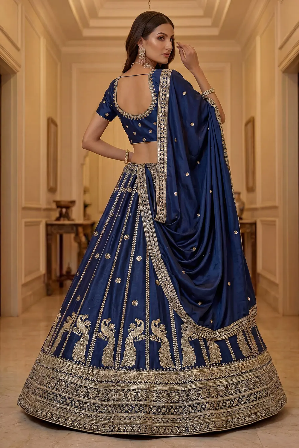 Gold zari embroidery and sequins on navy blue silk lehenga skirt