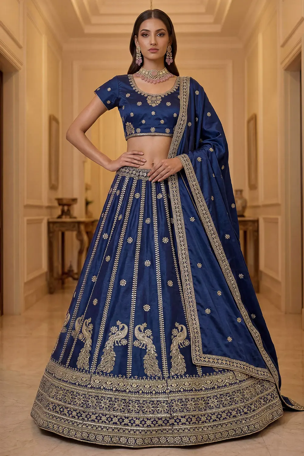 Navy blue silk lehenga styled with matching embroidered blouse and dupatta