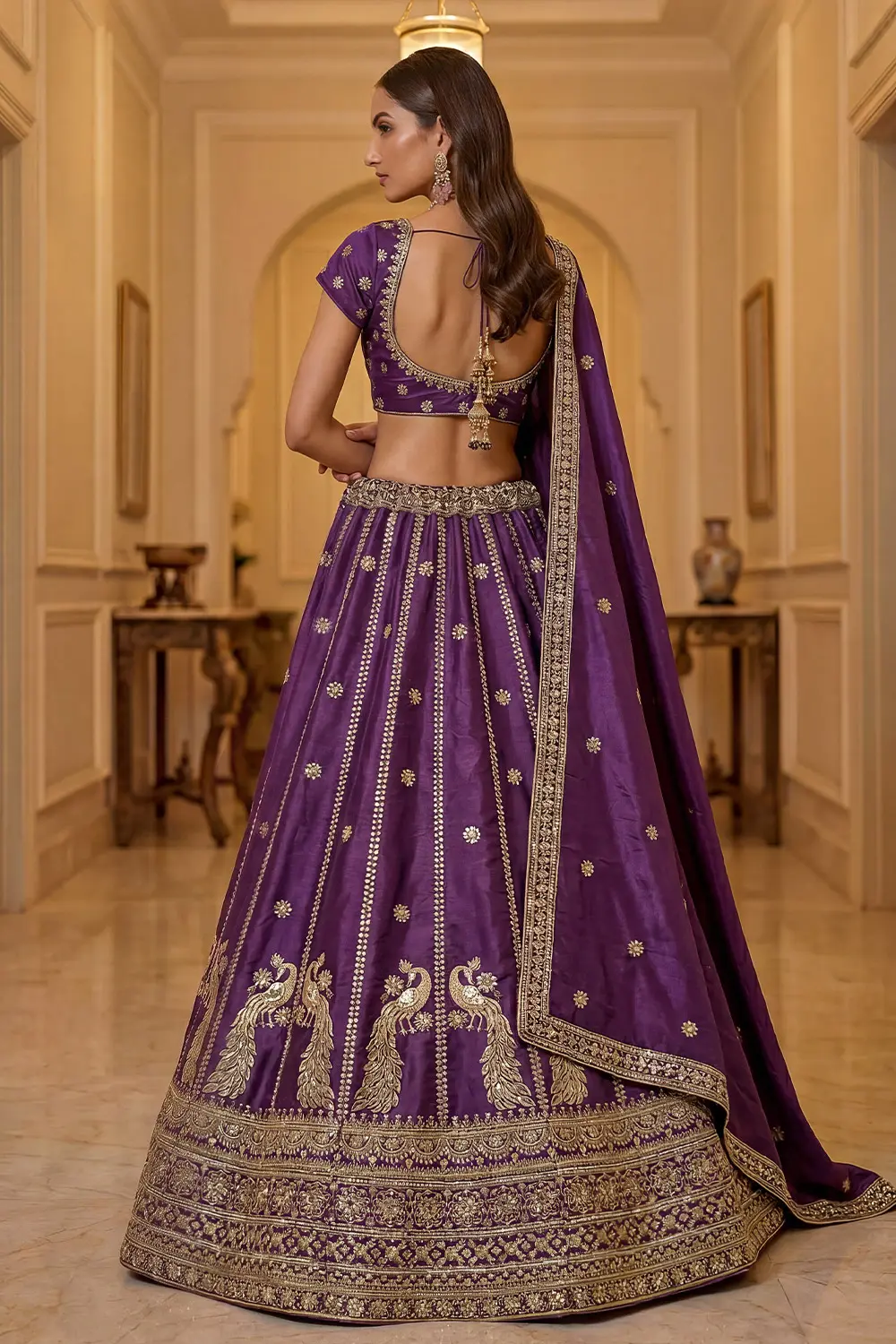 Gold zari embroidery and sequins on purple silk lehenga skirt