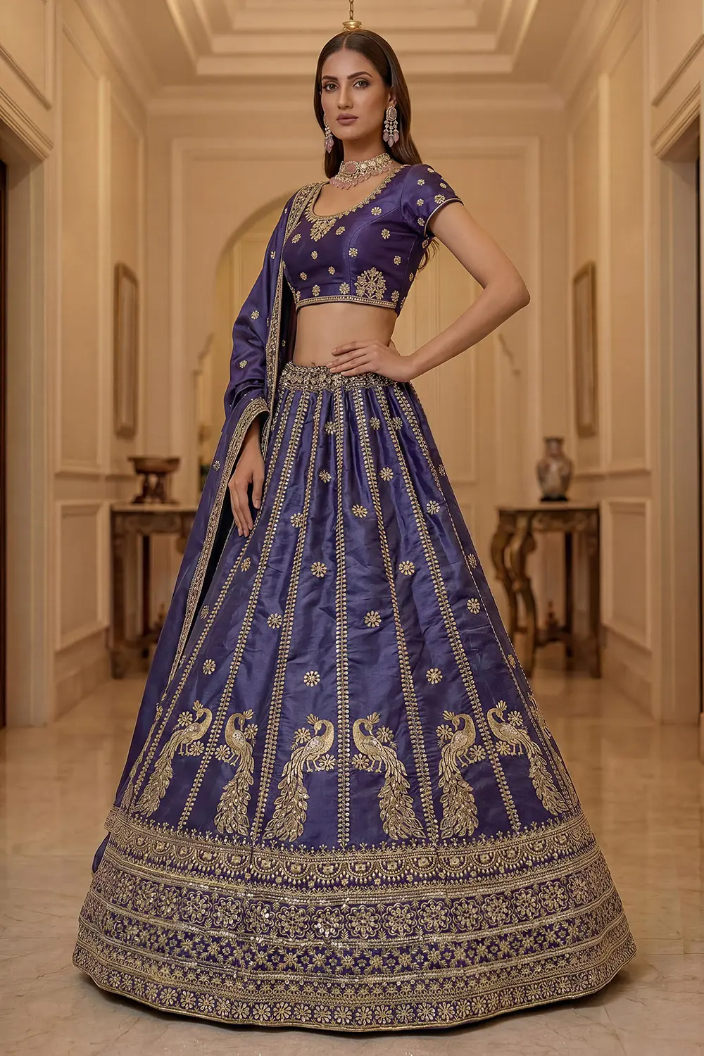 Delicate lacework and sequins on jewel-toned peacock blue lehenga dupatta