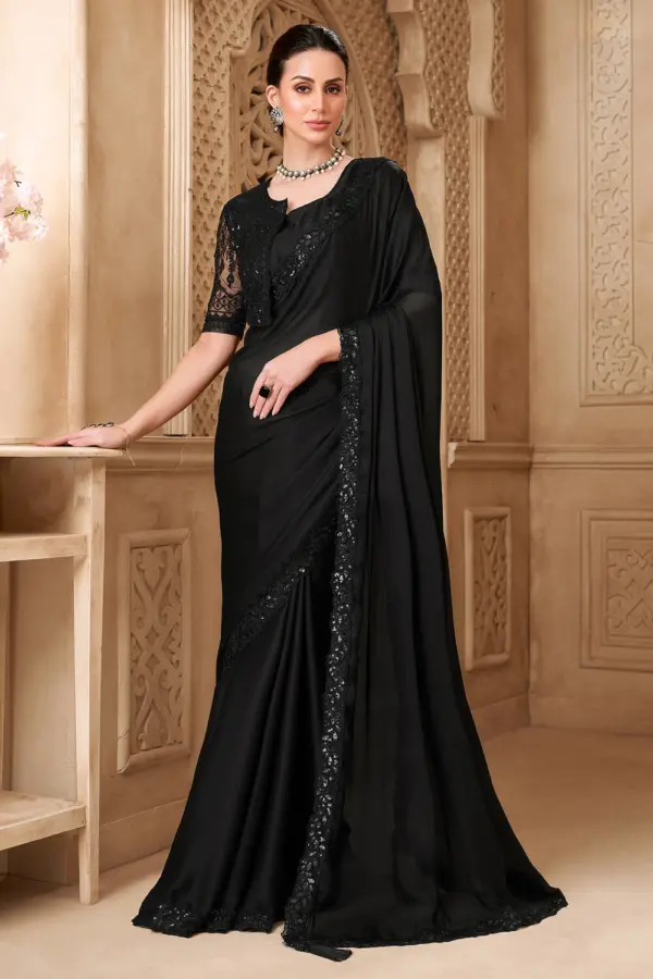 Black georgette saree with jacket and jacket work blouse by Khaish