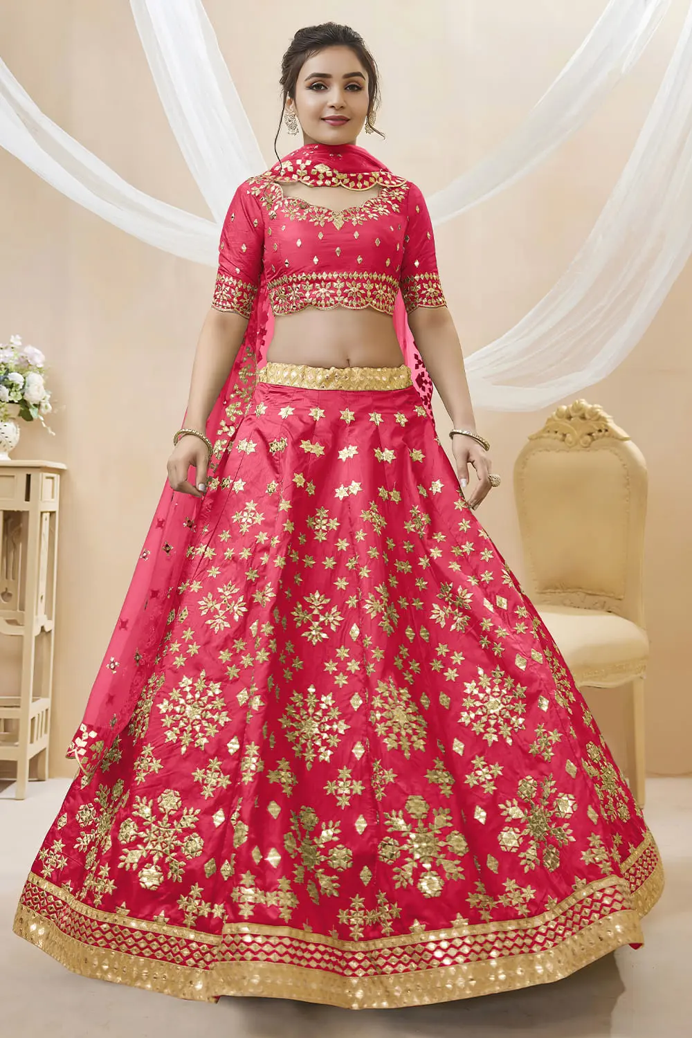 Pink art silk lehenga with foil and zari embroidery and net dupatta