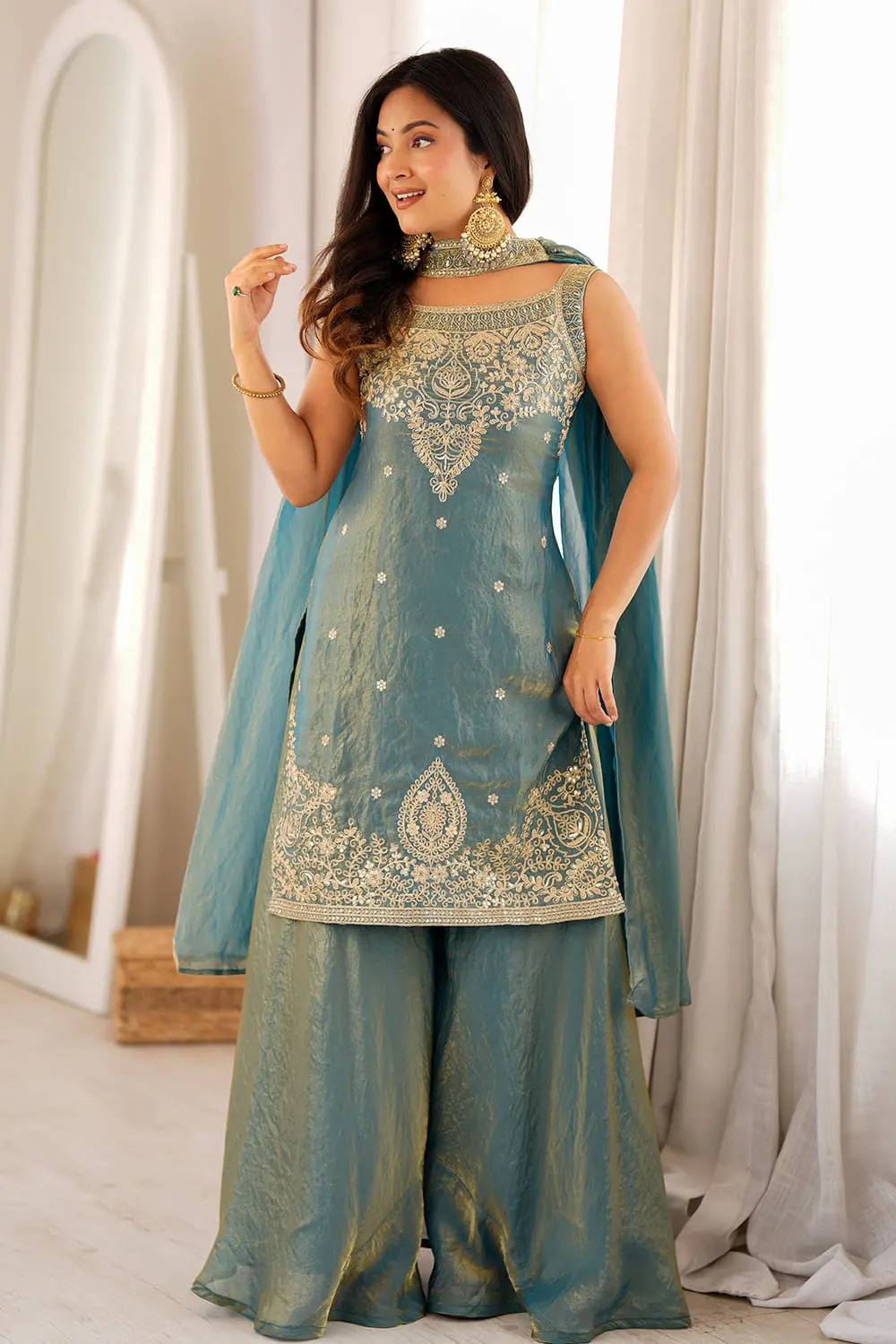 Teal green silk sharara set with lace-belt dupatta styled view