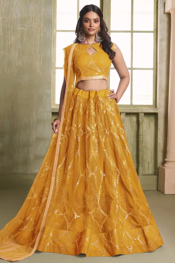 Yellow butterfly net lehenga for haldi with tone-to-tone thread work by Khaish