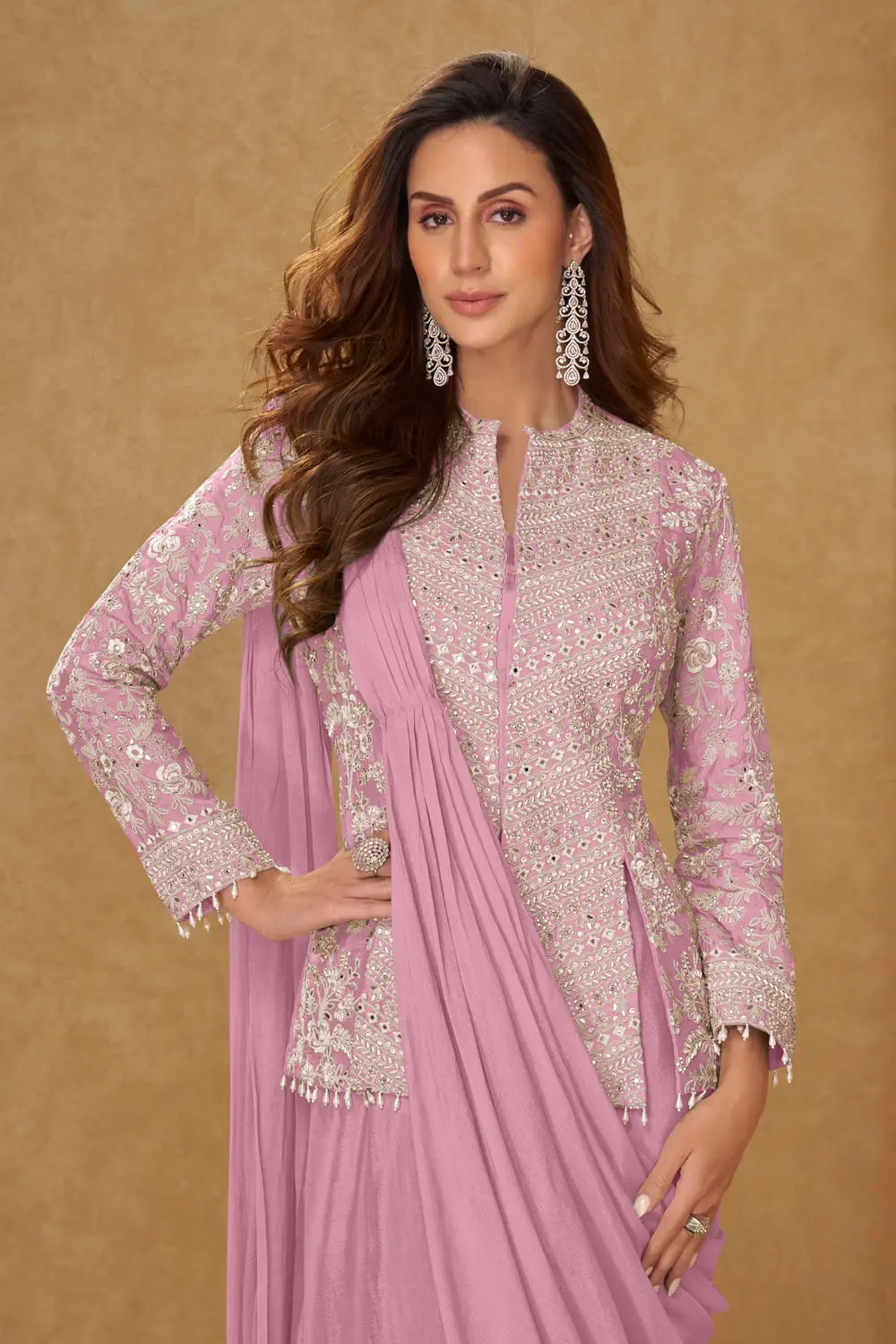 Pink chinon silk saree styled with embroidered jacket