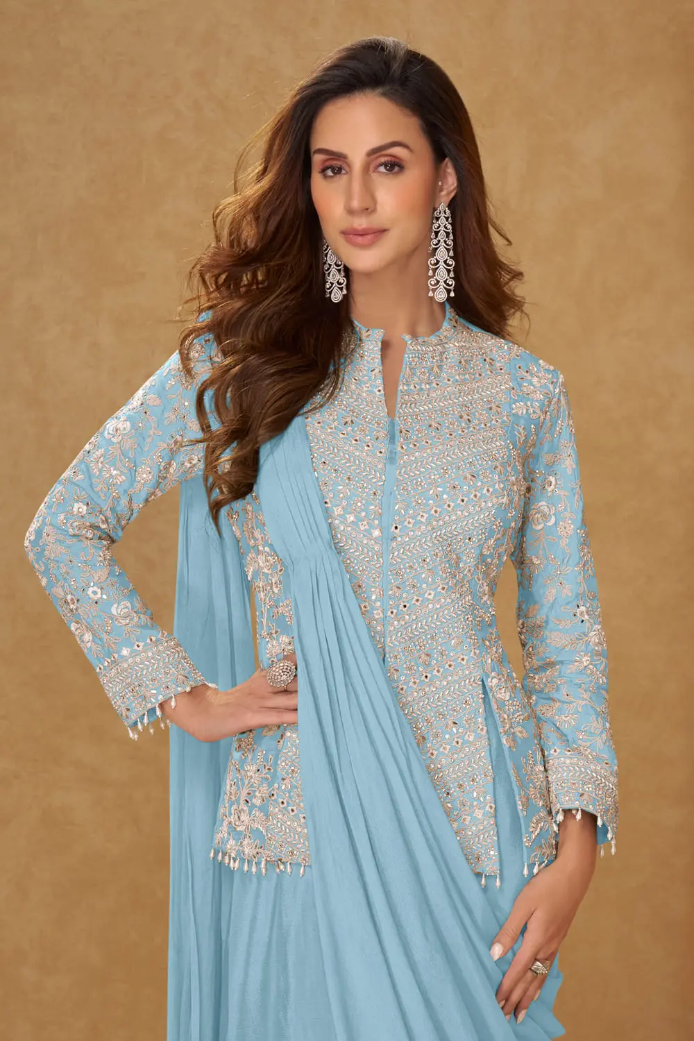 Sky blue chinon silk saree styled with embroidered jacket