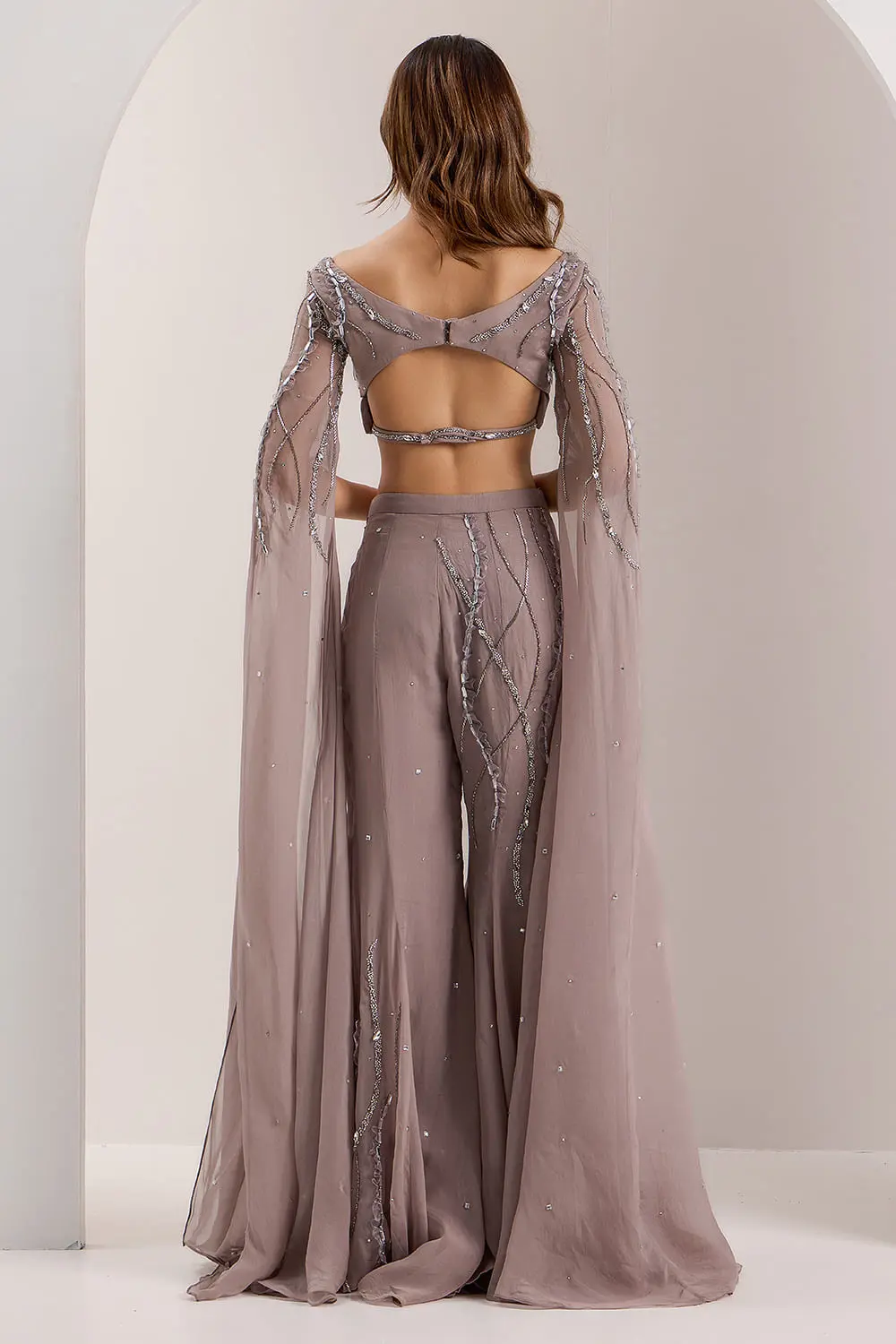 Back view of grey floor length blouse and flared pant set