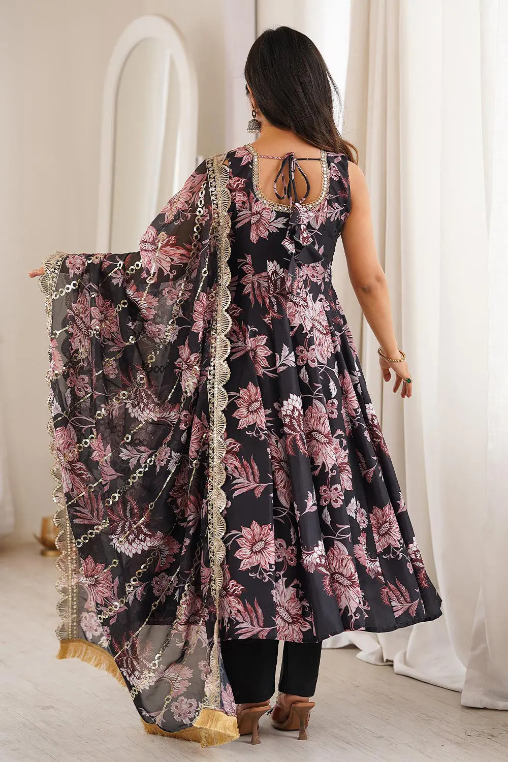 Back view of deep midnight blue muslin anarkali gown with pant