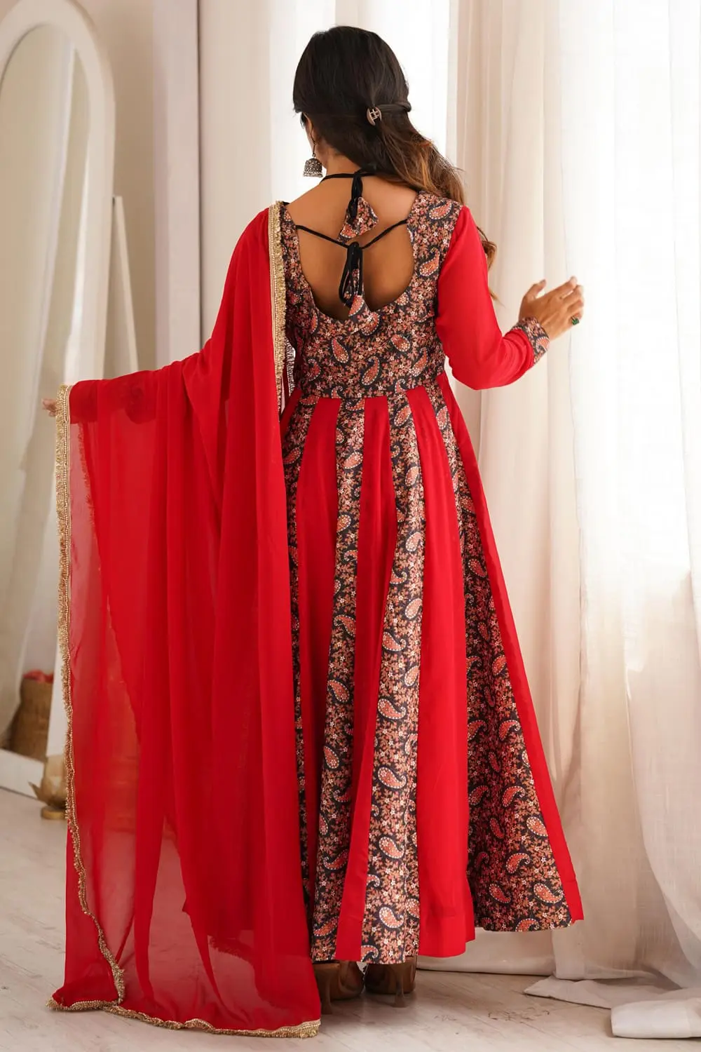 Back view of red anarkali gown with pant