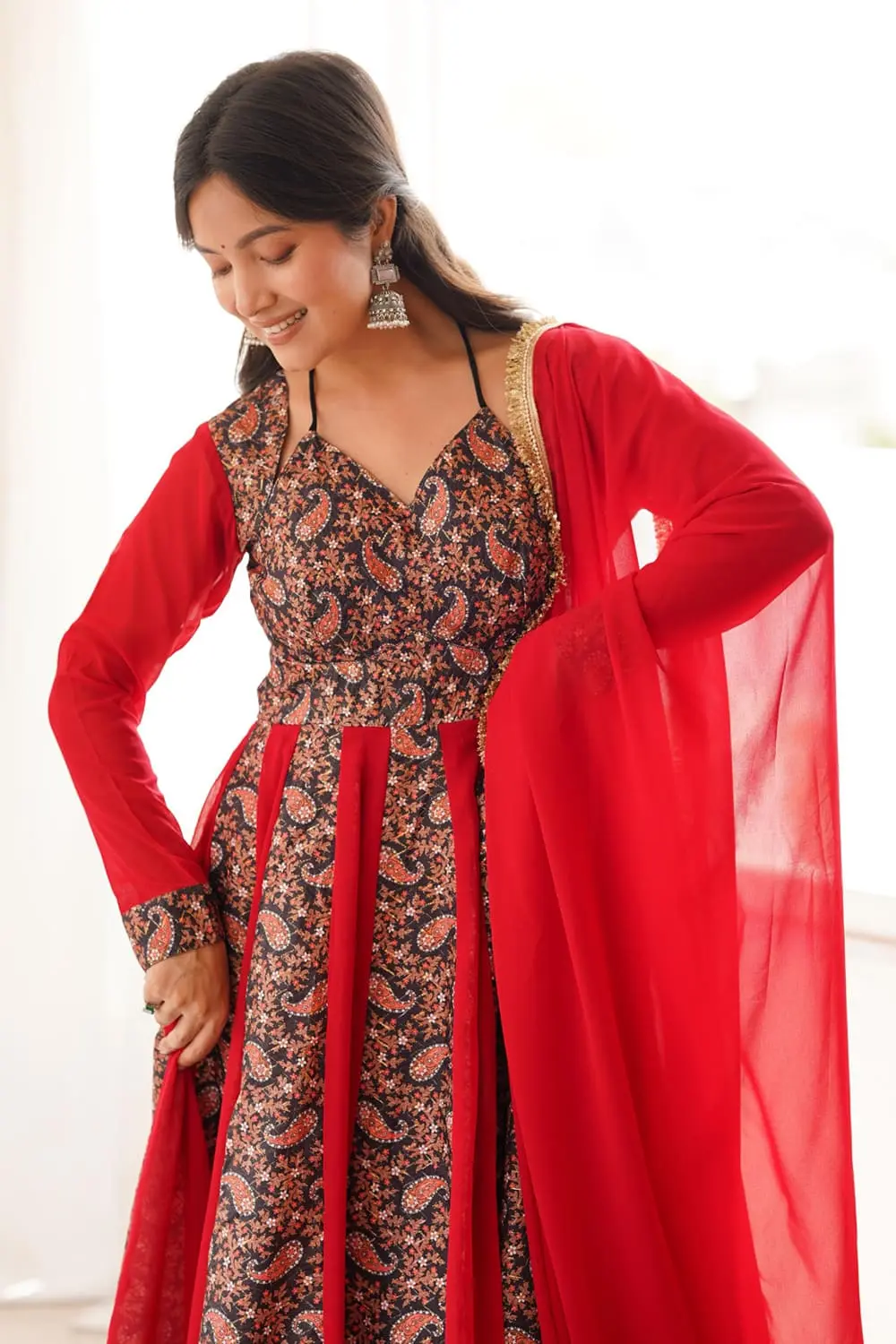 Close up of mulberry embroidery on red blooming georgette anarkali