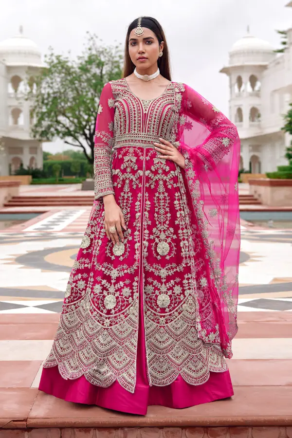 Pink anarkali dress for wedding in butterfly net with heavy embroidery by Khaish