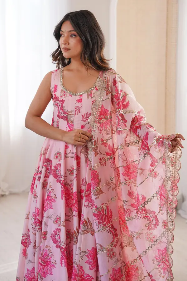 Close up of floral print and organza sequins dupatta on pink anarkali