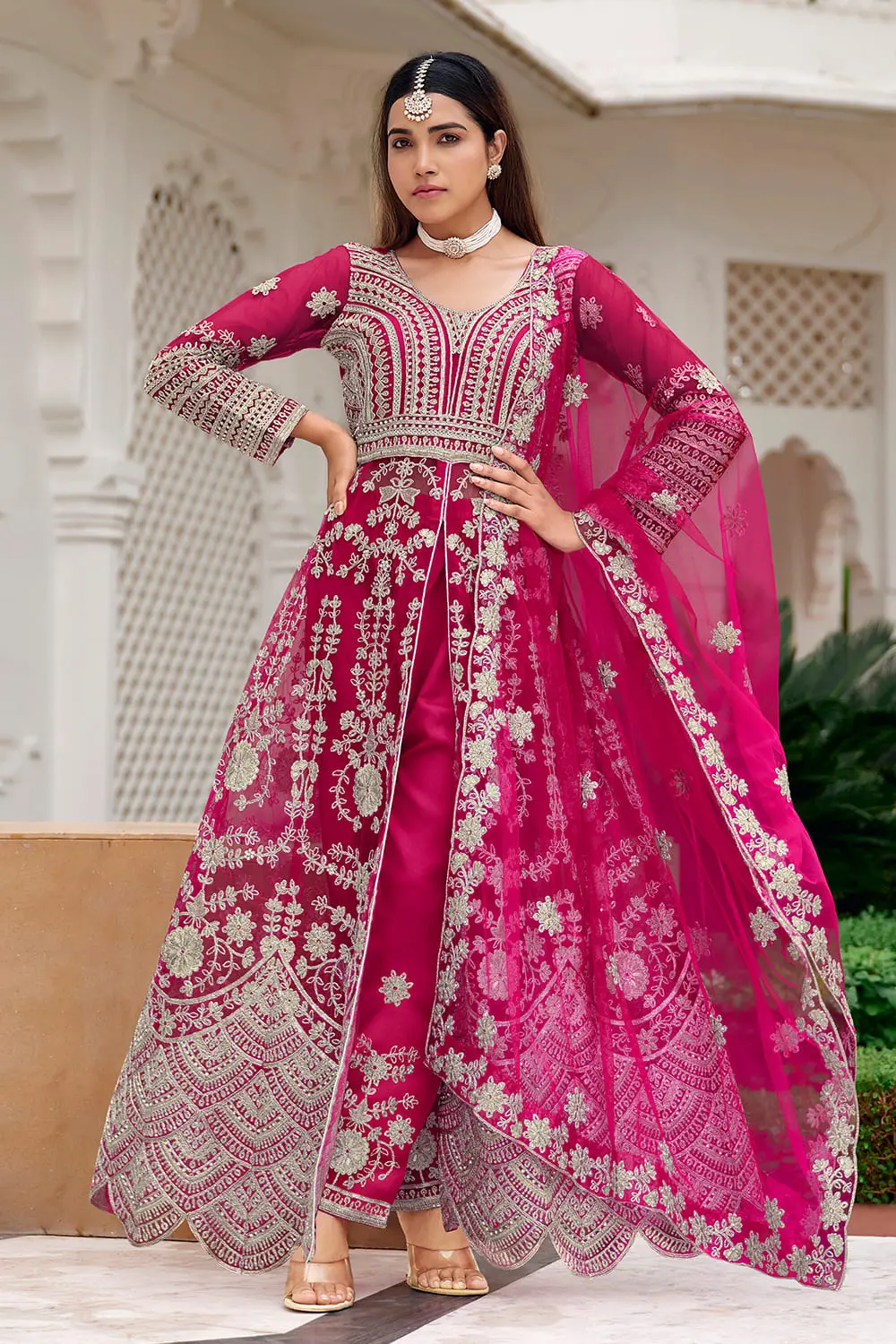 Pink butterfly net anarkali styled with flared skirt bottom and net dupatta
