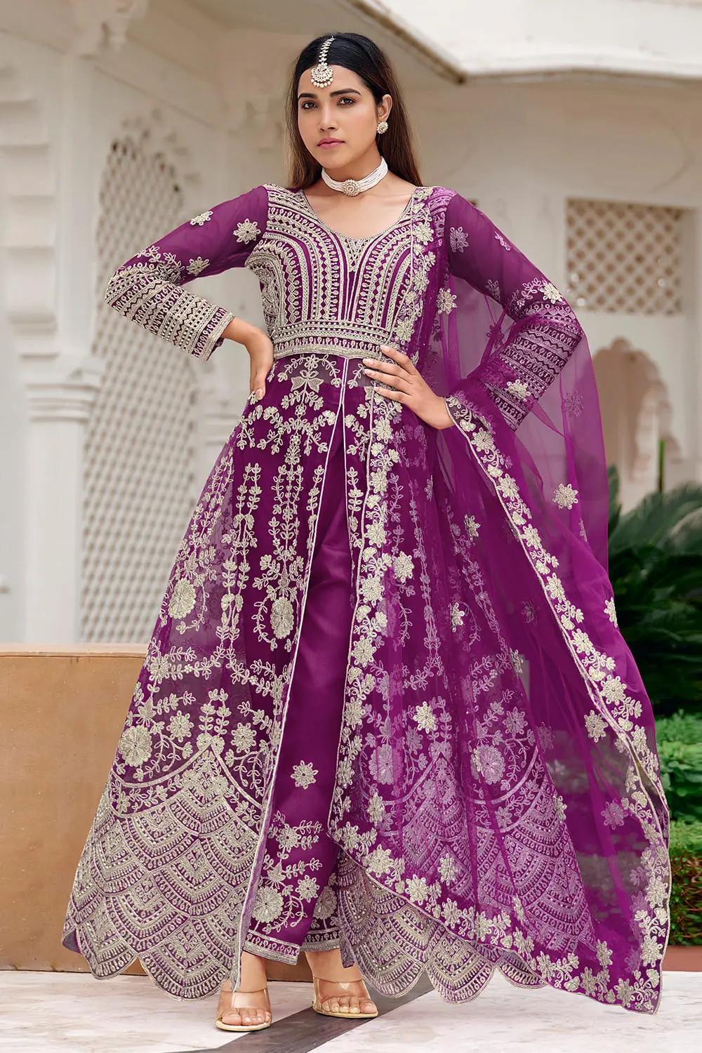 Purple anarkali suit styled with fitted santoon pant bottom