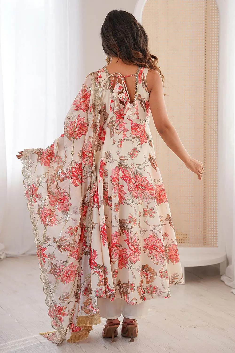 Back view of ivory muslin anarkali gown with pant