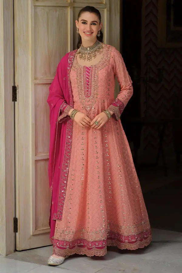 Peach anarkali gown for engagement in flowing georgette with embroidery by Khaish