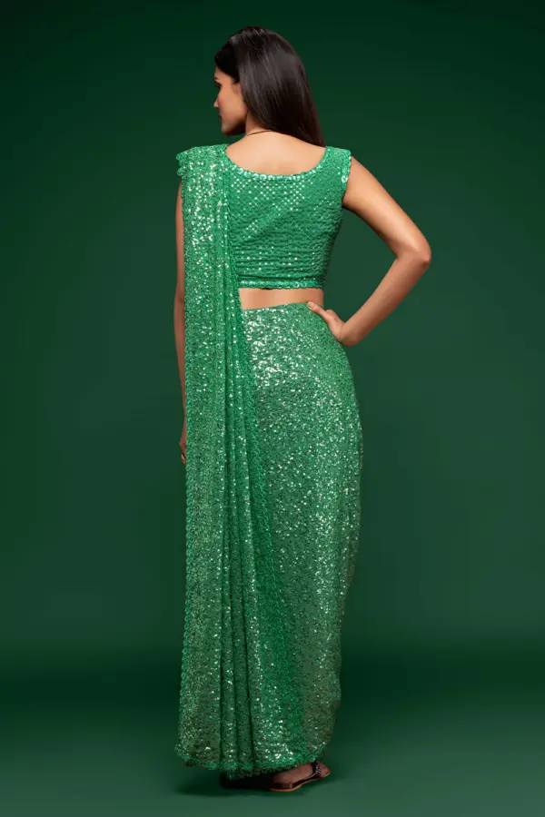 Back view of mint green georgette saree with sequin work