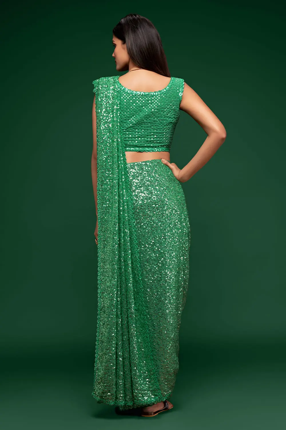 Back view of mint green georgette saree with sequin work