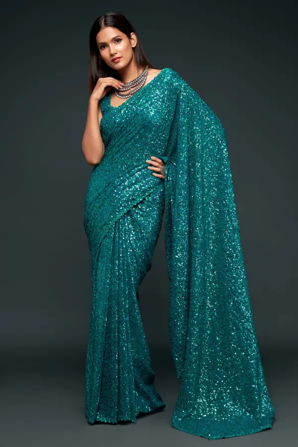 Teal blue georgette saree for reception with thread and sequins embroidery by Khaish