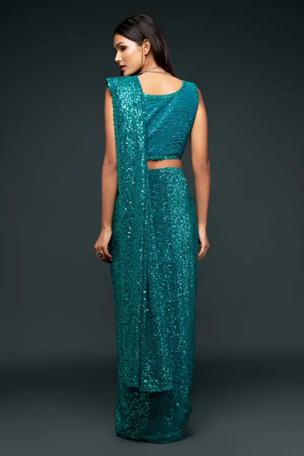 Back view of teal blue georgette saree with sequin work
