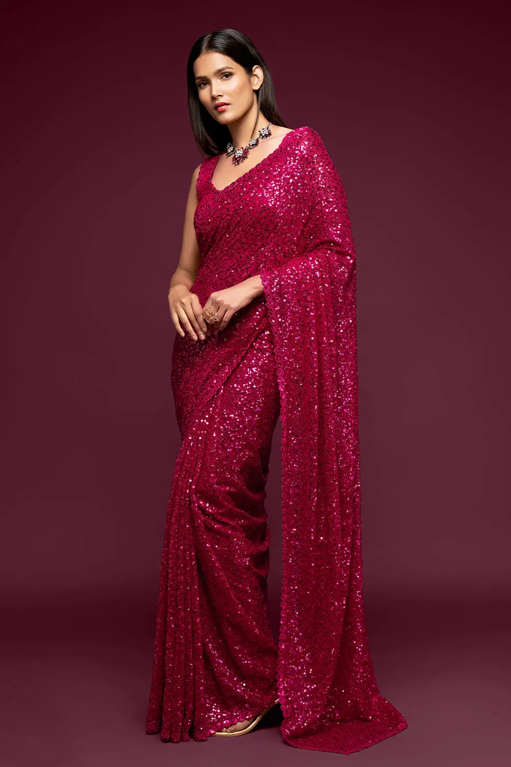 Hot pink sequin georgette saree with pallu draped full view