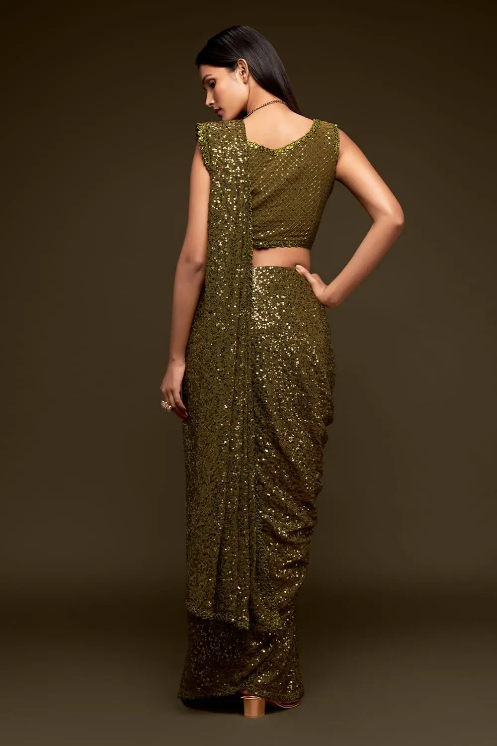 Back view of olive green georgette saree with sequin work