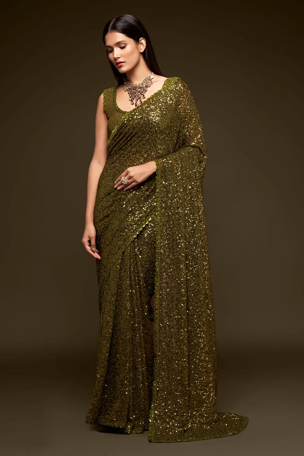 Olive green sequin georgette saree with pallu draped full view