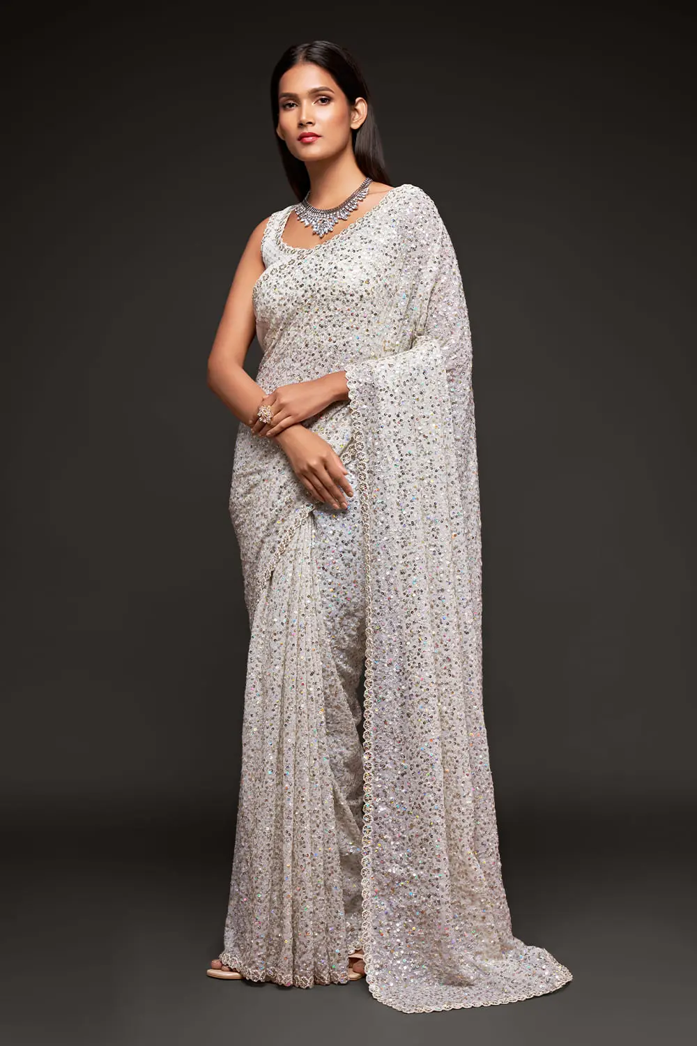 Off white georgette saree for wedding with thread and sequins embroidery by Khaish