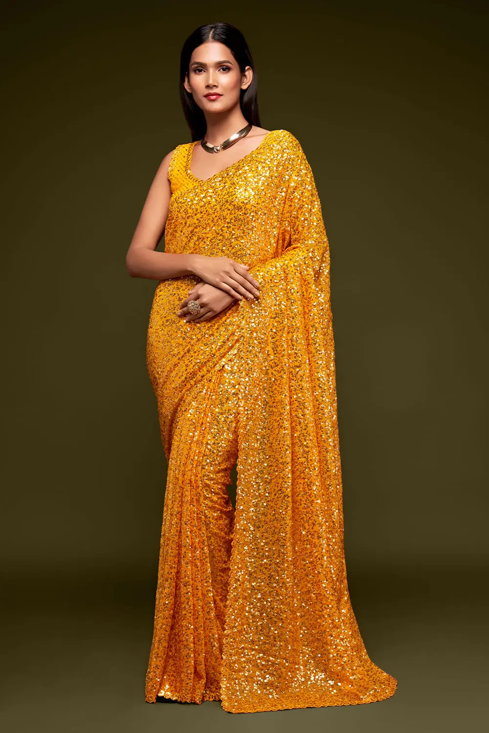 Honey yellow sequin georgette saree with pallu draped full view
