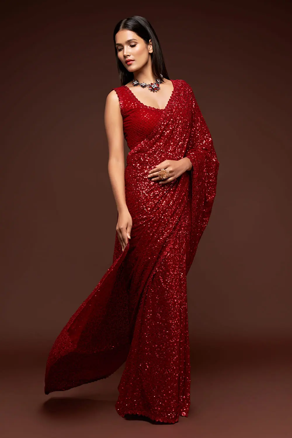Ruby red sequin georgette saree with pallu draped full view