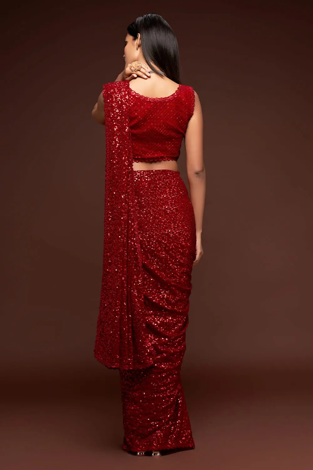 Back view of ruby red georgette saree with sequin work