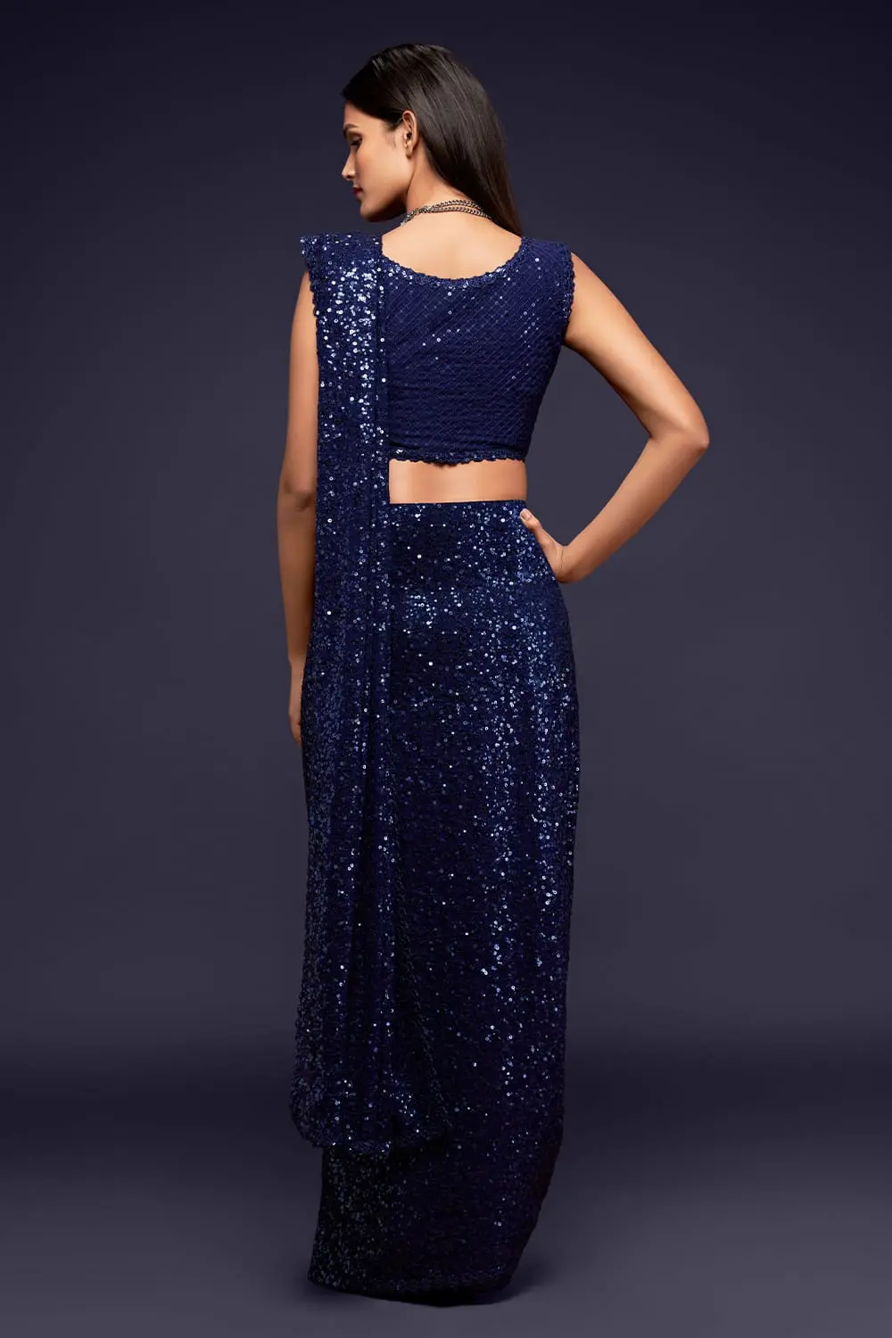 Back view of blush blue georgette saree with sequin work