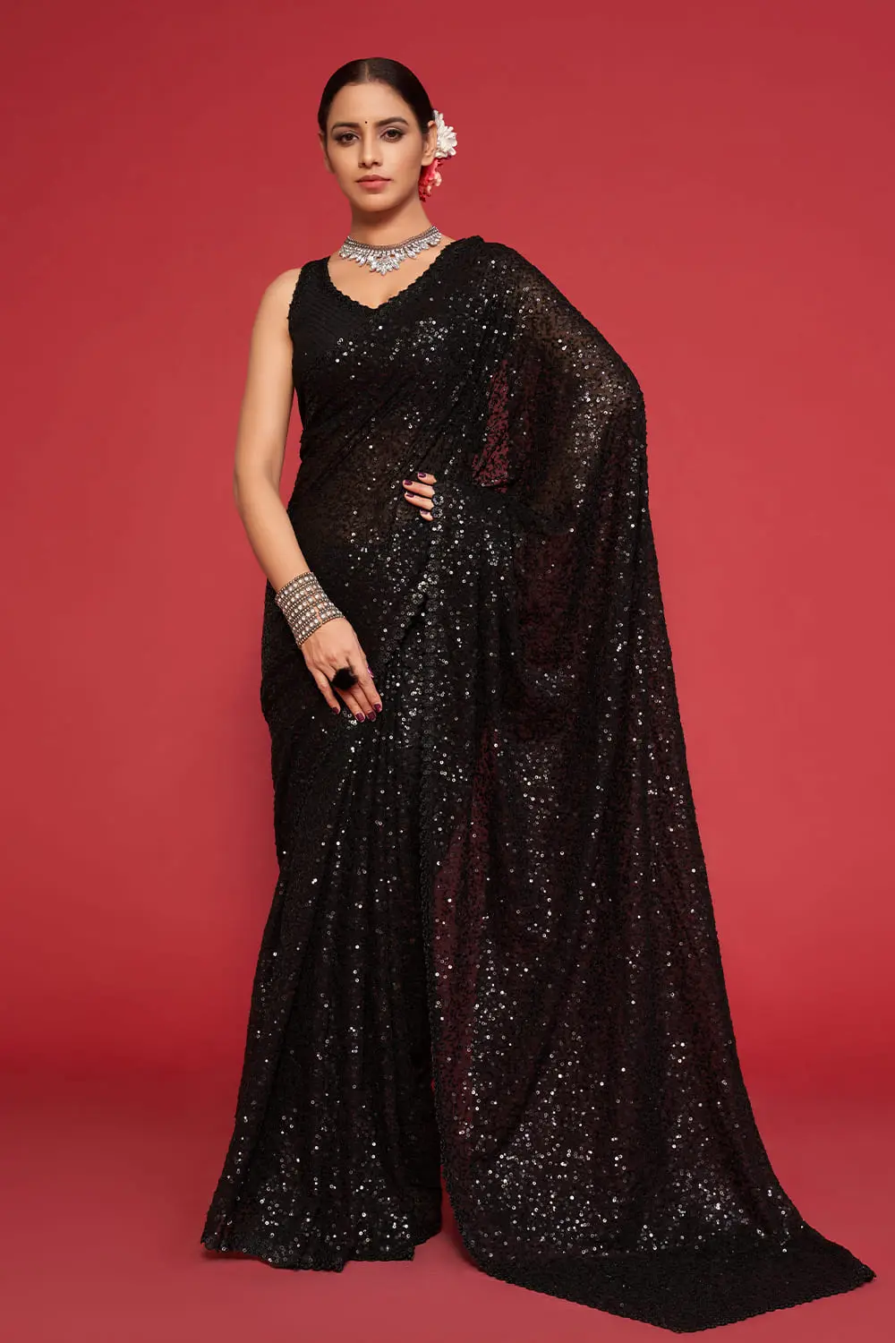 Black georgette saree with dense sequin embroidery pallu draped full view